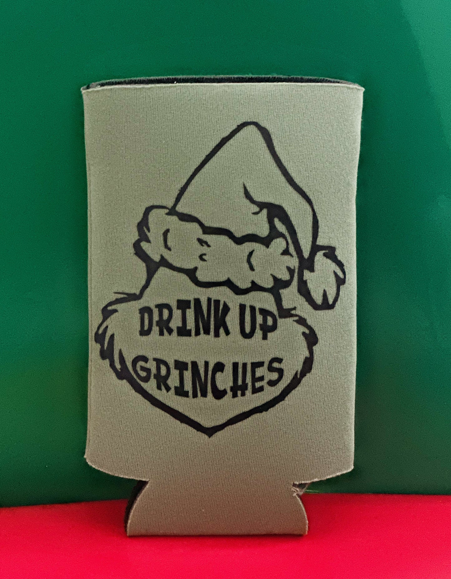 Drink up Grinches Koozie